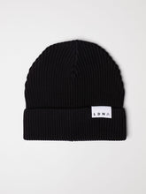 Load image into Gallery viewer, LDNA London black fisherman style beanie hat against white background.
