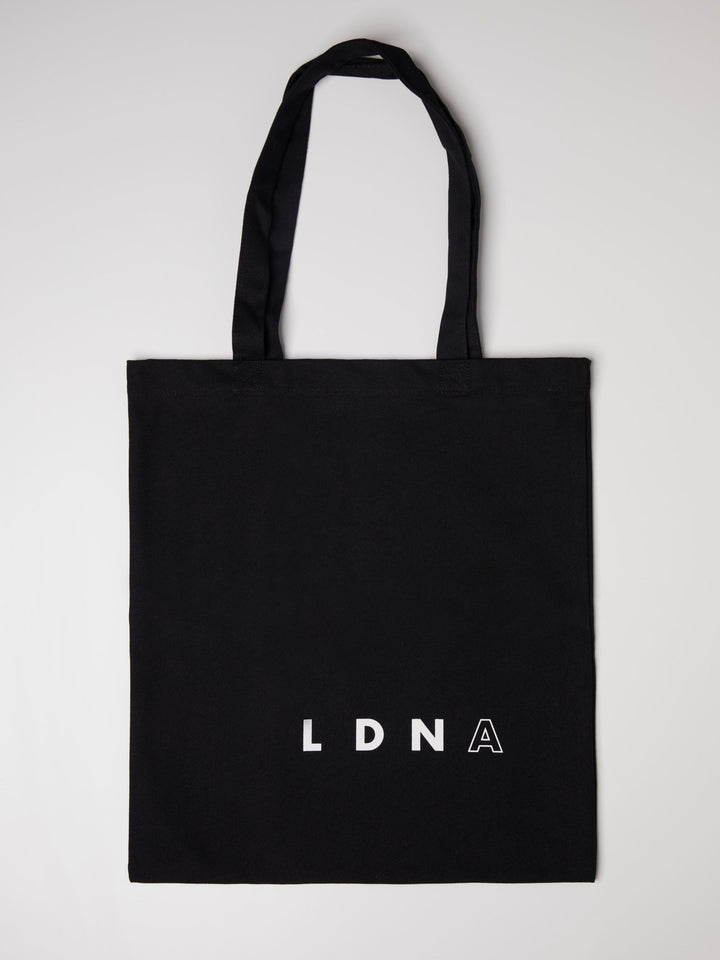 LDNA London black tote bag with LDNA logo against white background.