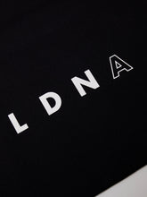 Load image into Gallery viewer, LDNA London black tote bag with zoom in of LDNA logo.
